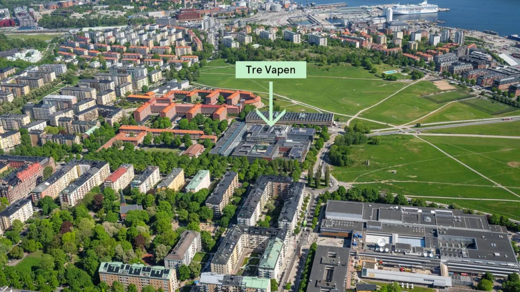 4. Flygbild över området Tre Vapen, markerat med en pil och texten "Tre Vapen".