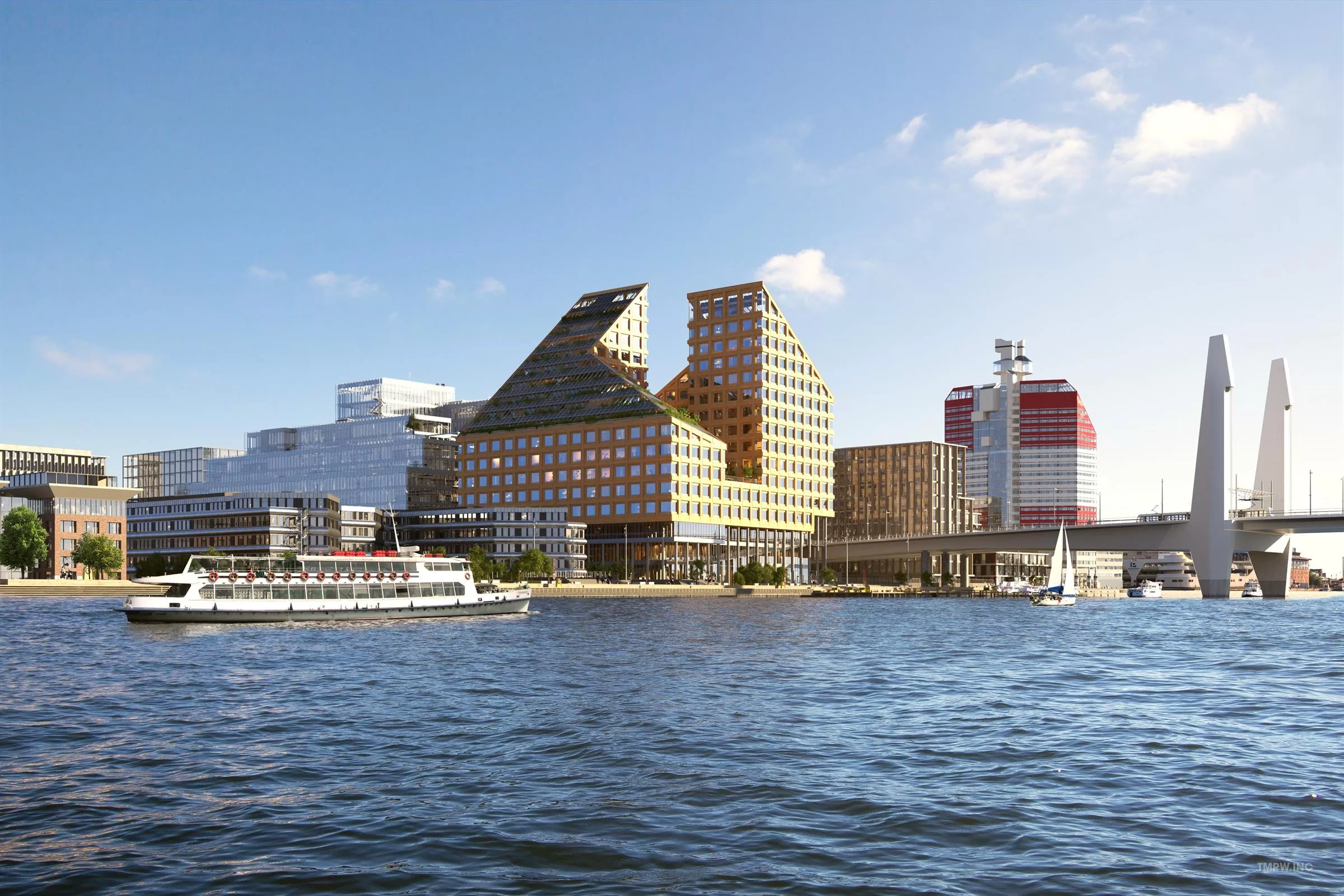 En vy över vattnet med en större båt och moderna byggnader, inklusive unika arkitektoniska strukturer, under en klar himmel.